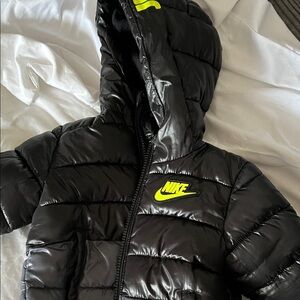 Nike Black Puffer Jacket with Neon Yellow Logo